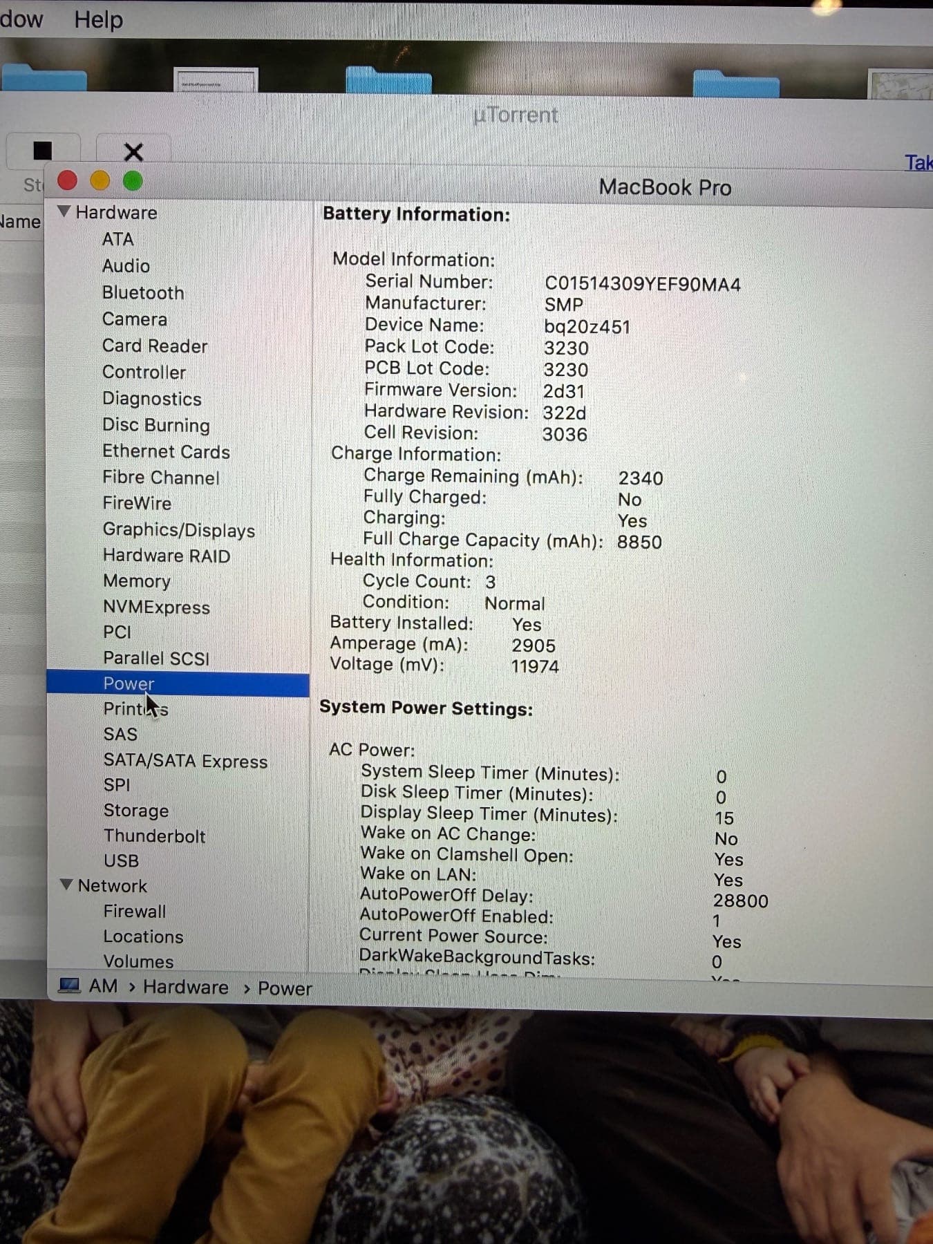 System Information Power pane on a MacBook Pro showing battery model, charge and health information with condition Normal